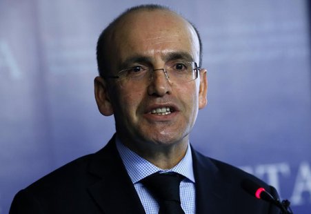 Turkey's Finance Minister Mehmet Simsek speaks during a meeting in Ankara January 30, 2014. REUTERS/Umit Bektas Turkey's Finance Minister Mehmet Simsek speaks during a meeting in Ankara January 30, 2014. REUTERS/Umit Bektas