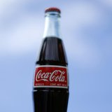 A bottle of Coca-Cola is shown in this photo illustration in Encinitas, California October 10, 2013. REUTERS/Mike Blake A bottle of Coca-Cola is shown in this photo illustration in Encinitas, California October 10, 2013. REUTERS/Mike Blake