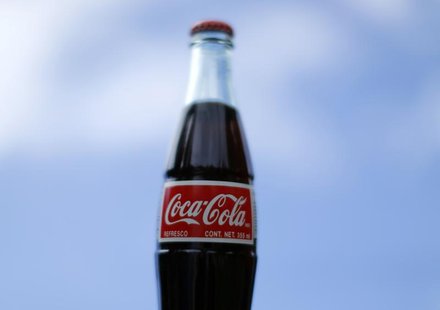 A bottle of Coca-Cola is shown in this photo illustration in Encinitas, California October 10, 2013. REUTERS/Mike Blake A bottle of Coca-Cola is shown in this photo illustration in Encinitas, California October 10, 2013. REUTERS/Mike Blake