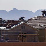 Roofers work on new homes at a residential construction site in the west side of the Las Vegas Valley in Las Vegas, Nevada April 5, 2013. RE Roofers work on new homes at a residential construction site in the west side of the Las Vegas Valley in Las Vegas, Nevada April 5, 2013. RE