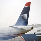 A US Airways Airbus A321-200 plane emits exhaust at Philadelphia International Airport in Philadelphia, Pennsylvania on December 9, 2013. RE A US Airways Airbus A321-200 plane emits exhaust at Philadelphia International Airport in Philadelphia, Pennsylvania on December 9, 2013. RE