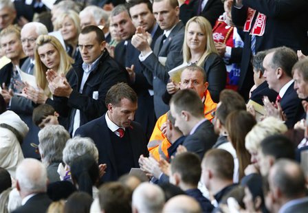 Liverpool manager Brendan Rodgers is applauded after speaking during a memorial service to mark the 25th anniversary of the Hillsborough dis Liverpool manager Brendan Rodgers is applauded after speaking during a memorial service to mark the 25th anniversary of the Hillsborough dis