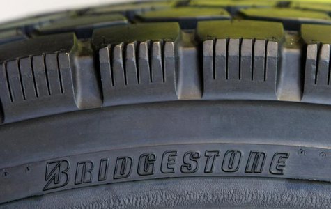 A tyre of Bridgestone Corp is displayed at its headquarters in Tokyo February 19, 2009. REUTERS/Kim Kyung-Hoon A tyre of Bridgestone Corp is displayed at its headquarters in Tokyo February 19, 2009. REUTERS/Kim Kyung-Hoon