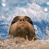 U.S. swimmer Michael Phelps swims the backstroke at a practice session during the USA Swimming Grand Prix Charlotte Ultra Swim in Charlotte, U.S. swimmer Michael Phelps swims the backstroke at a practice session during the USA Swimming Grand Prix Charlotte Ultra Swim in Charlotte,