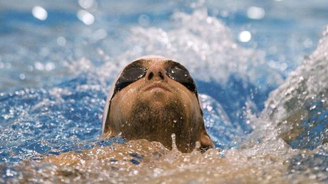 U.S. swimmer Michael Phelps swims the backstroke at a practice session during the USA Swimming Grand Prix Charlotte Ultra Swim in Charlotte, U.S. swimmer Michael Phelps swims the backstroke at a practice session during the USA Swimming Grand Prix Charlotte Ultra Swim in Charlotte,