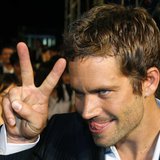 U.S. actor Paul Walker gestures to a fan during the premiere of the movie "Fast and Furious 4" in Taipei April 15, 2009. REUTERS/Nicky Loh U.S. actor Paul Walker gestures to a fan during the premiere of the movie "Fast and Furious 4" in Taipei April 15, 2009. REUTERS/Nicky Loh