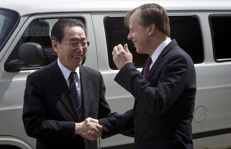 U.S. Special Representative for North Korea Policy Glyn Davies (R) shakes hands with China's special representative for Korean Peninsula Aff U.S. Special Representative for North Korea Policy Glyn Davies (R) shakes hands with China's special representative for Korean Peninsula Aff