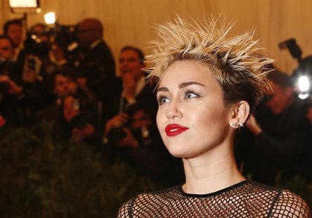 Singer and actress Miley Cyrus arrives at the Metropolitan Museum of Art Costume Institute Benefit celebrating the opening of "PUNK: Chaos t Singer and actress Miley Cyrus arrives at the Metropolitan Museum of Art Costume Institute Benefit celebrating the opening of "PUNK: Chaos t