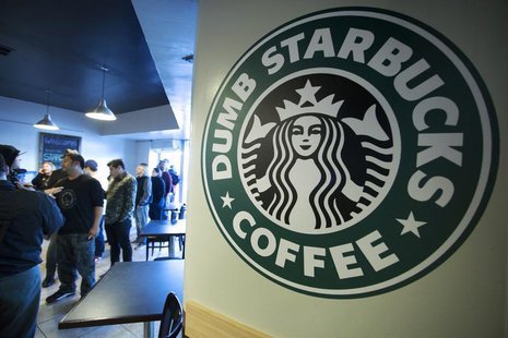 People line up inside "Dumb Starbucks", a parody store of the Starbucks Coffee chain, in Los Angeles, California February 10, 2014. REUTERS/ People line up inside "Dumb Starbucks", a parody store of the Starbucks Coffee chain, in Los Angeles, California February 10, 2014. REUTERS/