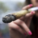 A woman smokes a large joint before The Global Marijuana March in Toronto, May 7, 2011. REUTERS/Mark Blinch A woman smokes a large joint before The Global Marijuana March in Toronto, May 7, 2011. REUTERS/Mark Blinch