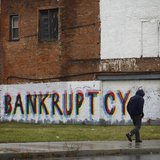A man walk past graffiti in Detroit, Michigan, December 3, 2013. REUTERS/Joshua Lott A man walk past graffiti in Detroit, Michigan, December 3, 2013. REUTERS/Joshua Lott