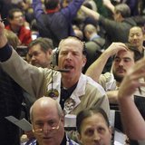 Traders in the corn options pit at the CME Group signal orders shortly before the closing bell in Chicago, in this February 11, 2011 file ph Traders in the corn options pit at the CME Group signal orders shortly before the closing bell in Chicago, in this February 11, 2011 file ph