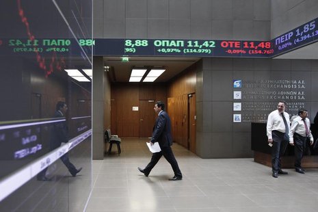 A man makes his way inside the reception hall of the Greek Stock Exchange in Athens April 10, 2014. REUTERS/Alkis Konstantinidis A man makes his way inside the reception hall of the Greek Stock Exchange in Athens April 10, 2014. REUTERS/Alkis Konstantinidis