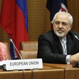 European Union foreign policy chief Catherine Ashton (L) and Iranian Foreign Minister Mohammad Javad Zarif wait for the start of talks in Vi European Union foreign policy chief Catherine Ashton (L) and Iranian Foreign Minister Mohammad Javad Zarif wait for the start of talks in Vi