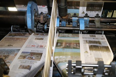 The first copies of the inaugural Los Angeles Register newspaper run off the presses in Santa Ana, California April 16, 2014. REUTERS/Lucy N The first copies of the inaugural Los Angeles Register newspaper run off the presses in Santa Ana, California April 16, 2014. REUTERS/Lucy N