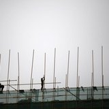 Labourers work at a construction site in Beijing, April 16, 2014. REUTERS/Kim Kyung-Hoon Labourers work at a construction site in Beijing, April 16, 2014. REUTERS/Kim Kyung-Hoon