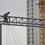 A labourer works at a construction site in Hefei, Anhui province, April 15, 2014. REUTERS/Stringer A labourer works at a construction site in Hefei, Anhui province, April 15, 2014. REUTERS/Stringer