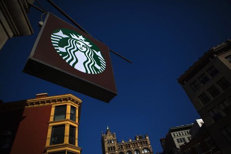 The sign of a Starbucks store is seen in New York January 24, 2014. REUTERS/Eric Thayer The sign of a Starbucks store is seen in New York January 24, 2014. REUTERS/Eric Thayer