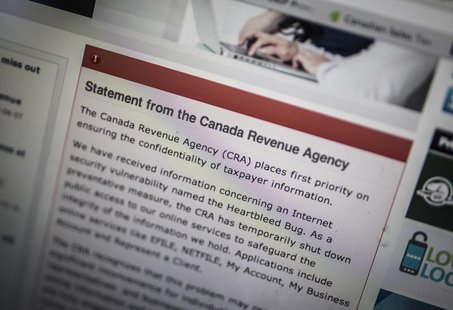 The Canada Revenue Agency website is seen on a computer screen displaying information about an internet security vulnerability called the "H The Canada Revenue Agency website is seen on a computer screen displaying information about an internet security vulnerability called the "H