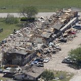 A block of residences is pictured near the site of a fertilizer plant explosion in West, Texas, pictured from the air as U.S. President Bara A block of residences is pictured near the site of a fertilizer plant explosion in West, Texas, pictured from the air as U.S. President Bara