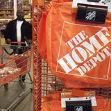 A customer wheels a cart through a Home Depot store in Washington February 20, 2012. REUTERS/Jonathan Ernst A customer wheels a cart through a Home Depot store in Washington February 20, 2012. REUTERS/Jonathan Ernst