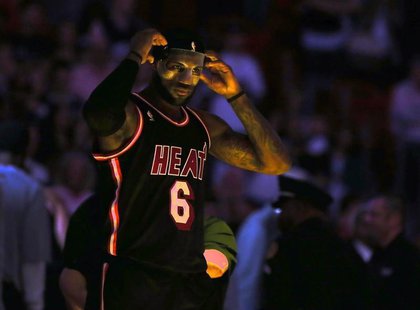 Mar 1, 2014; Miami, FL, USA; Miami Heat small forward LeBron James (6) adjusts his mask before a game against the Orlando Magic at American Mar 1, 2014; Miami, FL, USA; Miami Heat small forward LeBron James (6) adjusts his mask before a game against the Orlando Magic at American