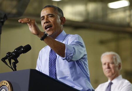 U.S. President Barack Obama speaks next to U.S. Vice President Joseph Biden after touring the Community College of Allegheny West Hills Cent U.S. President Barack Obama speaks next to U.S. Vice President Joseph Biden after touring the Community College of Allegheny West Hills Cent