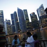 Tourists take a boat cruise along the Singapore River in the central business district in Singapore November 7, 2013. REUTERS/Edgar Su Tourists take a boat cruise along the Singapore River in the central business district in Singapore November 7, 2013. REUTERS/Edgar Su