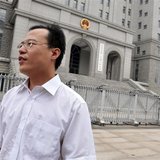 Lawyer Hao Junbo stands outside a court in Beijing, in this picture taken August 18, 2009. REUTERS/Stringer Lawyer Hao Junbo stands outside a court in Beijing, in this picture taken August 18, 2009. REUTERS/Stringer