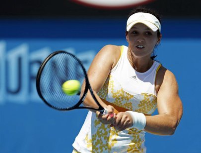 Laura Robson of Britain hits a return to Kirsten Flipkens of Belgium during their women's singles match at the Australian Open 2014 tennis t Laura Robson of Britain hits a return to Kirsten Flipkens of Belgium during their women's singles match at the Australian Open 2014 tennis t