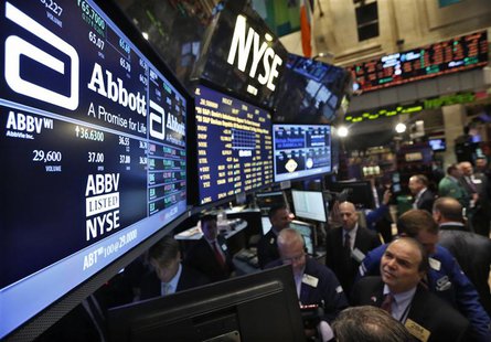 Traders gather at the booth that trades Abbott Laboratories on the floor of the New York Stock Exchange in this file photo taken December 10 Traders gather at the booth that trades Abbott Laboratories on the floor of the New York Stock Exchange in this file photo taken December 10
