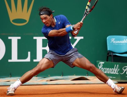 Rafael Nadal of Spain returns the ball to his compatriot David Ferrer during their quarter-final match at the Monte Carlo Masters in Monaco Rafael Nadal of Spain returns the ball to his compatriot David Ferrer during their quarter-final match at the Monte Carlo Masters in Monaco