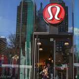 A shopper walks out of the Lululemon Athletica store in New York, December 16, 2013. REUTERS/Shannon Stapleton A shopper walks out of the Lululemon Athletica store in New York, December 16, 2013. REUTERS/Shannon Stapleton