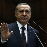 Turkey's Prime Minister Tayyip Erdogan addresses members of parliament from his ruling AK Party (AKP) during a meeting at the Turkish parlia Turkey's Prime Minister Tayyip Erdogan addresses members of parliament from his ruling AK Party (AKP) during a meeting at the Turkish parlia