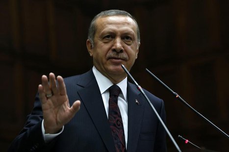 Turkey's Prime Minister Tayyip Erdogan addresses members of parliament from his ruling AK Party (AKP) during a meeting at the Turkish parlia Turkey's Prime Minister Tayyip Erdogan addresses members of parliament from his ruling AK Party (AKP) during a meeting at the Turkish parlia
