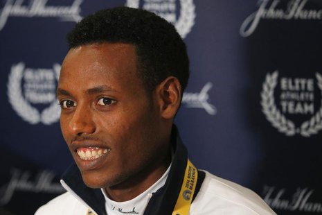 Defending Boston Marathon champion Lelisa Desisa of Ethiopia answers questions at a news conference in Boston, Massachusetts April 18, 2014. Defending Boston Marathon champion Lelisa Desisa of Ethiopia answers questions at a news conference in Boston, Massachusetts April 18, 2014.