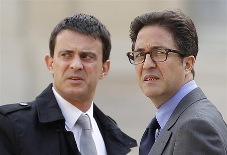 Manuel Valls (L), who is France's current Prime Minister, and Aquilino Morelle, French politician and former person in charge of the preside Manuel Valls (L), who is France's current Prime Minister, and Aquilino Morelle, French politician and former person in charge of the preside