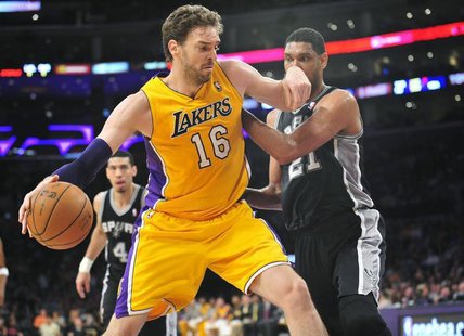 March 19, 2014; Los Angeles, CA, USA; Los Angeles Lakers center Pau Gasol (16) moves to the basket against the San Antonio Spurs during the March 19, 2014; Los Angeles, CA, USA; Los Angeles Lakers center Pau Gasol (16) moves to the basket against the San Antonio Spurs during the