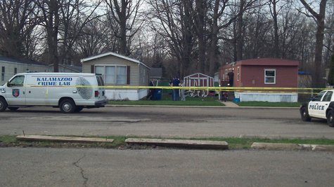 The body was found in the brown mobile home, and remained there for sometime after it was discovered, while lab techs went over the interior and exterior of the place. . The body was found in the brown mobile home, and remained there for sometime after it was discovered, while lab techs went over the interior and exterior of the place. .