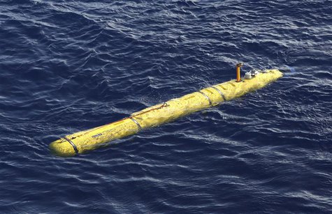 The Bluefin-21 Autonomous Underwater Vehicle sits in the water after being deployed from the Australian Defence Vessel Ocean Shield in the s The Bluefin-21 Autonomous Underwater Vehicle sits in the water after being deployed from the Australian Defence Vessel Ocean Shield in the s