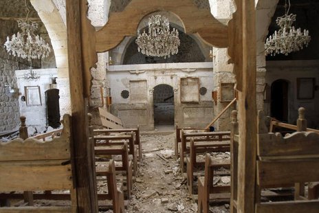 Debris lie inside a damaged church in Mar Bacchus Sarkis monastery, in Maloula village, northeast of Damascus, after soldiers loyal to Syria Debris lie inside a damaged church in Mar Bacchus Sarkis monastery, in Maloula village, northeast of Damascus, after soldiers loyal to Syria