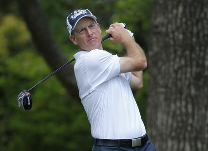 U.S. golfer Jim Furyk hits his tee shot on the second hole during the final round of the Masters golf tournament at the Augusta National Gol U.S. golfer Jim Furyk hits his tee shot on the second hole during the final round of the Masters golf tournament at the Augusta National Gol