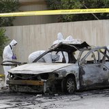 Forensic experts investigate at the scene of a car explosion in the village of al-Maqshaa, west of Manama April 19, 2014. REUTERS/Hamad I Mo Forensic experts investigate at the scene of a car explosion in the village of al-Maqshaa, west of Manama April 19, 2014. REUTERS/Hamad I Mo