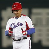 Cuba's Frederich Cepeda reacts after hitting an RBI double against Japan in the fourth inning at the World Baseball Classic (WBC) qualifying Cuba's Frederich Cepeda reacts after hitting an RBI double against Japan in the fourth inning at the World Baseball Classic (WBC) qualifying