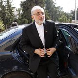 Former Iranian Foreign Minister Ali Akbar Salehi reacts upon his arrival to attend the official opening ceremony for the new headquarters of Former Iranian Foreign Minister Ali Akbar Salehi reacts upon his arrival to attend the official opening ceremony for the new headquarters of