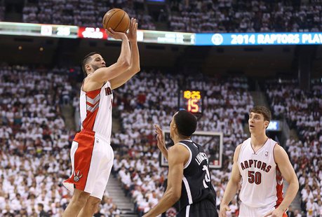 Apr 19, 2014; Toronto, Ontario, CAN; Toronto Raptors guard Greivis Vasquez (21) hits a three-pointer against the Brooklyn Nets in game one d Apr 19, 2014; Toronto, Ontario, CAN; Toronto Raptors guard Greivis Vasquez (21) hits a three-pointer against the Brooklyn Nets in game one d