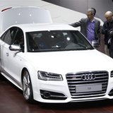 Visitors look at an Audi S8 car at Auto China 2014 in Beijing April 20, 2014. REUTERS/Jason Lee Visitors look at an Audi S8 car at Auto China 2014 in Beijing April 20, 2014. REUTERS/Jason Lee