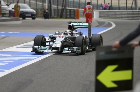 Mercedes Formula One driver Lewis Hamilton of Britain drives to a pit stop during the Chinese F1 Grand Prix at the Shanghai International Ci Mercedes Formula One driver Lewis Hamilton of Britain drives to a pit stop during the Chinese F1 Grand Prix at the Shanghai International Ci