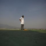 A doctor expecting the arrival of the victims of a Mount Everest avalanche standbys near the helipad at Grandi International Hospital in Kat A doctor expecting the arrival of the victims of a Mount Everest avalanche standbys near the helipad at Grandi International Hospital in Kat