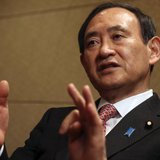 Japan's Chief Cabinet Secretary Yoshihide Suga speaks during an interview with Reuters in Tokyo February 15, 2014. To match interview JAPAN- Japan's Chief Cabinet Secretary Yoshihide Suga speaks during an interview with Reuters in Tokyo February 15, 2014. To match interview JAPAN-